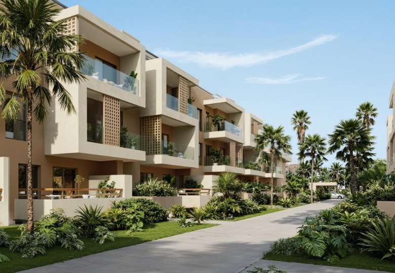 Allées arborées et façades contemporaines d'une résidence gérée au Maroc
